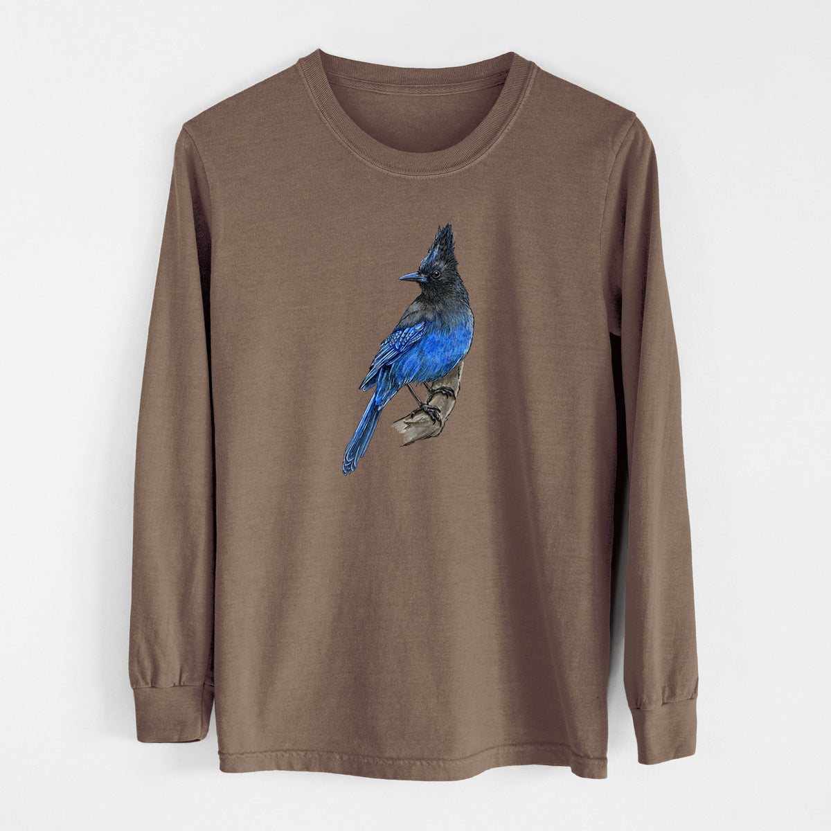 Espresso brown Comfort Colors long sleeve shirt laid flat, printed with a full-color illustration of a Steller's jay perched with its dark crest raised.