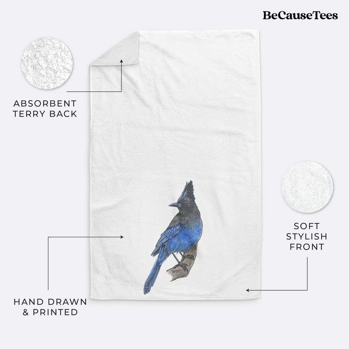 White hand towel printed with a full-color illustration of a Steller's jay perched with its dark crest raised.