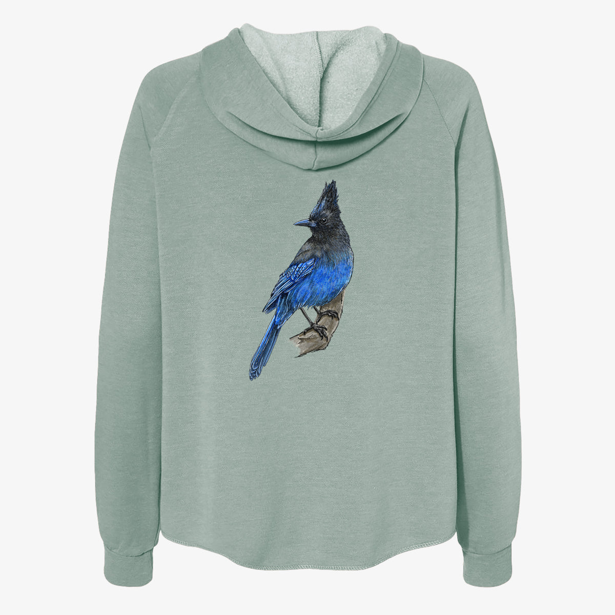 Sage green women's Cali Wave zip-up sweatshirt laid flat, printed with a full-color illustration of a Steller's jay perched with its dark crest raised.