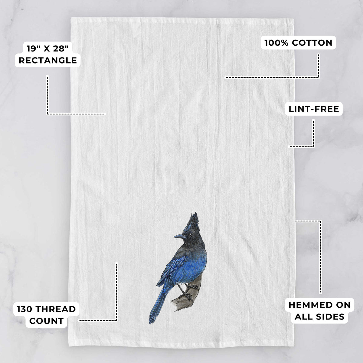 White tea towel printed with a full-color illustration of a Steller's jay perched with its dark crest raised, with feature labels: 19 by 28 inch rectangle, 100% cotton, lint-free, 130 thread count, hemmed on all sides.
