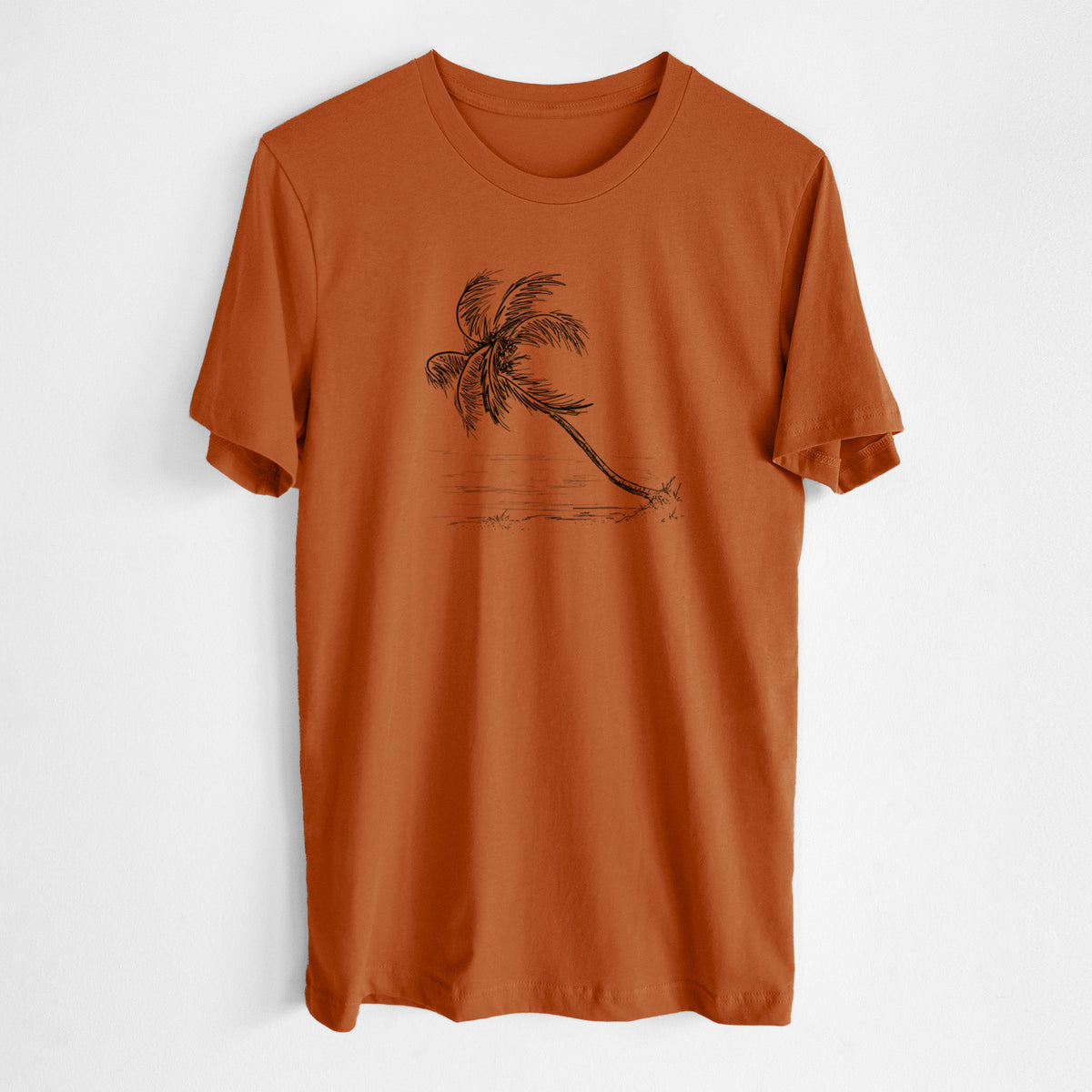 Autumn lightweight cotton t-shirt laid flat, printed with a black ink illustration of a coconut palm leaning over a sandy beach.