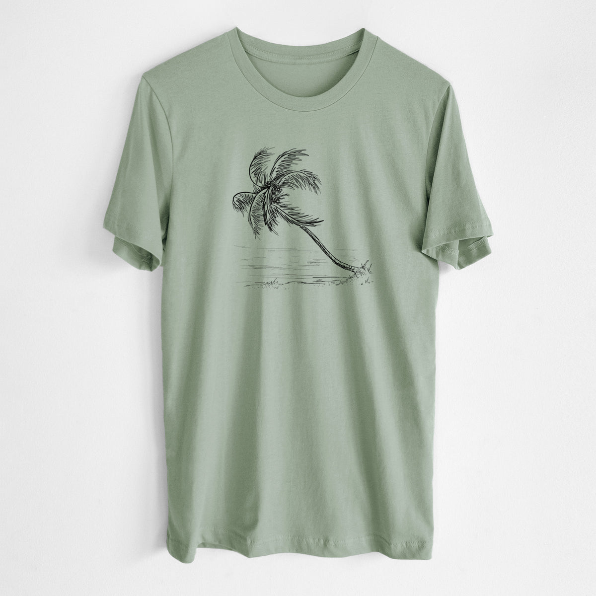 Sage green lightweight cotton t-shirt laid flat, printed with a black ink illustration of a coconut palm leaning over a sandy beach.