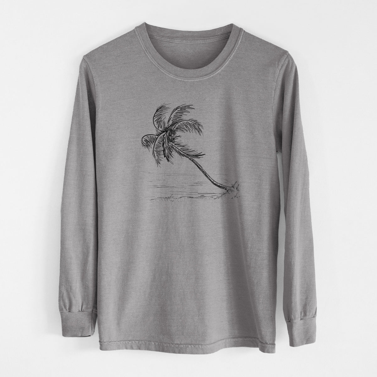 Grey Comfort Colors long sleeve shirt laid flat, printed with a black ink illustration of a coconut palm leaning over a sandy beach.