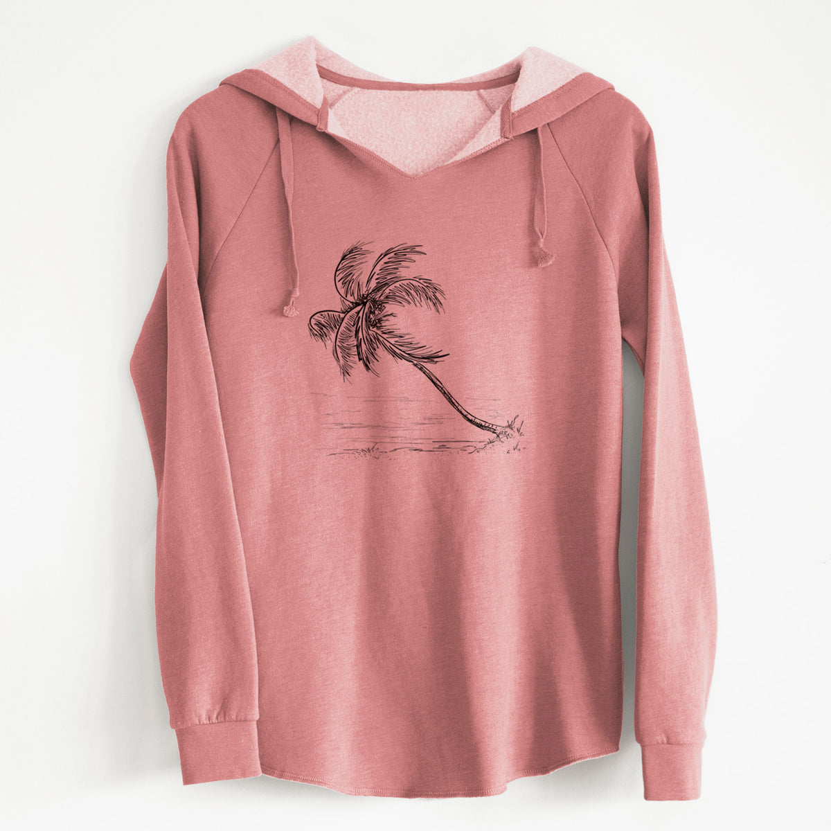Dusty rose women's Cali Wave hooded sweatshirt laid flat, printed with a black ink illustration of a coconut palm leaning over a sandy beach.