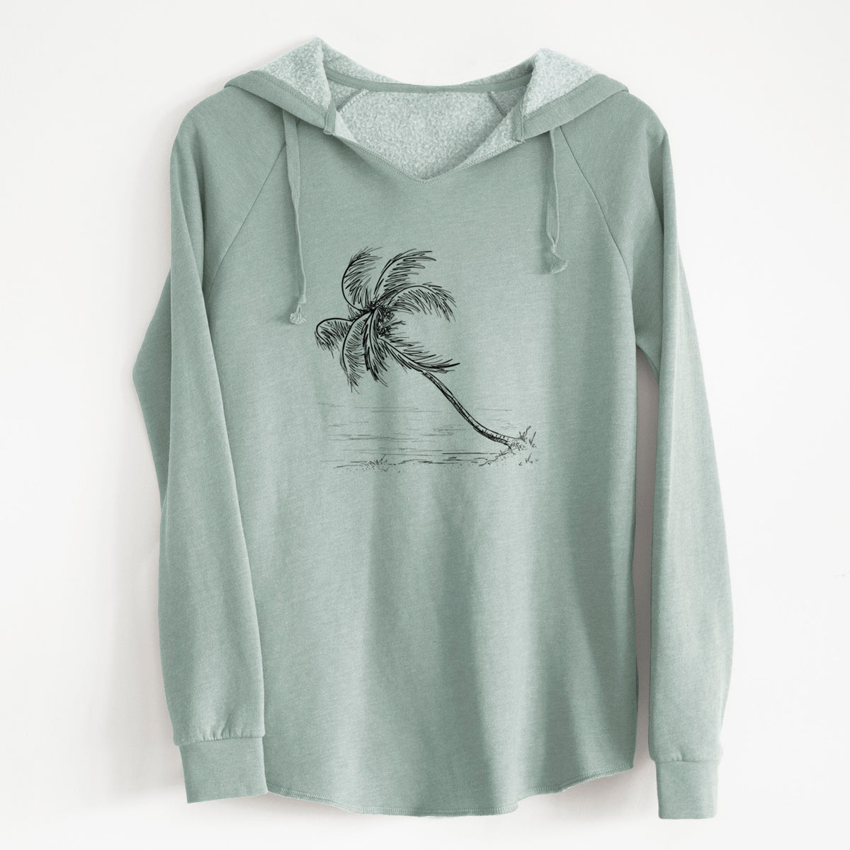 Sage green women's Cali Wave hooded sweatshirt laid flat, printed with a black ink illustration of a coconut palm leaning over a sandy beach.