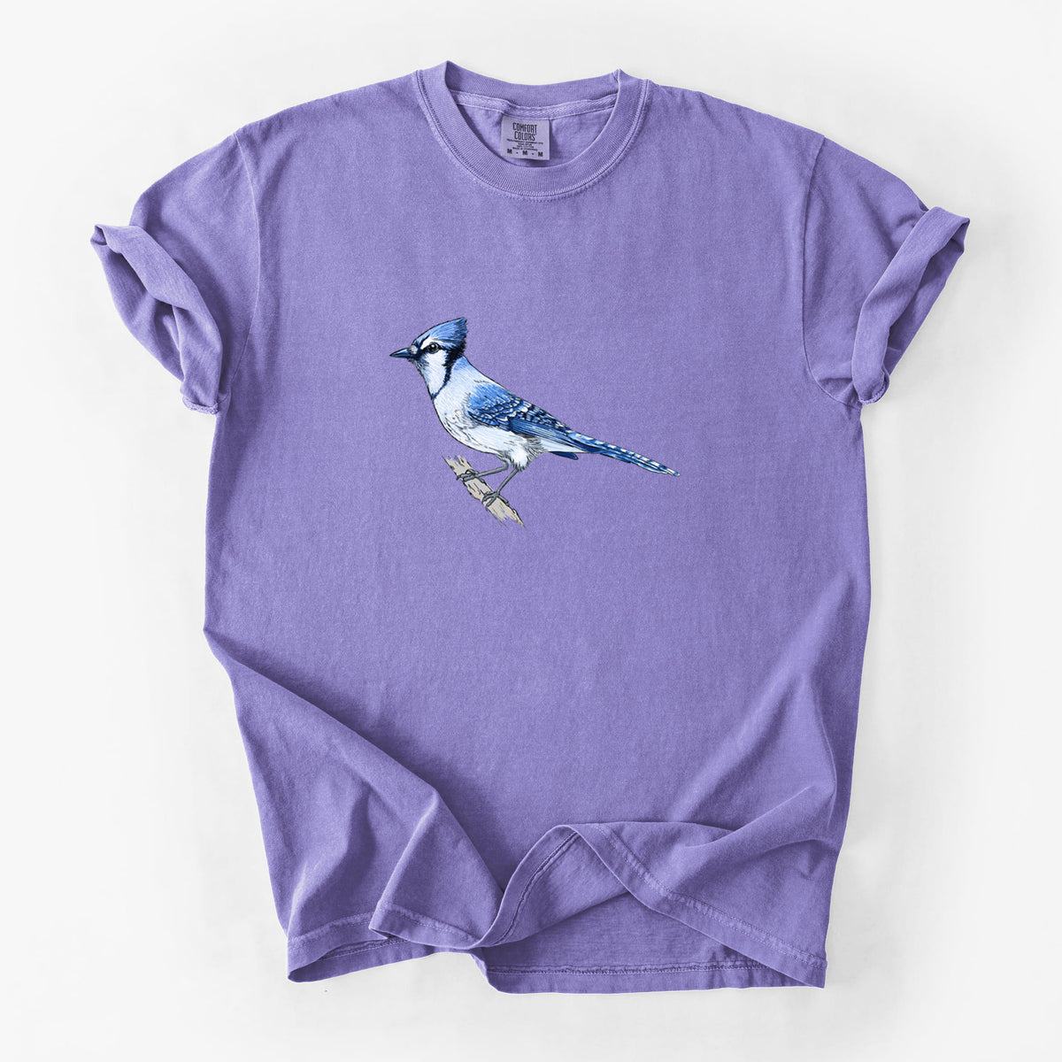 Violet purple Comfort Colors t-shirt laid flat, printed with a full-color illustration of a blue jay perched on a branch.