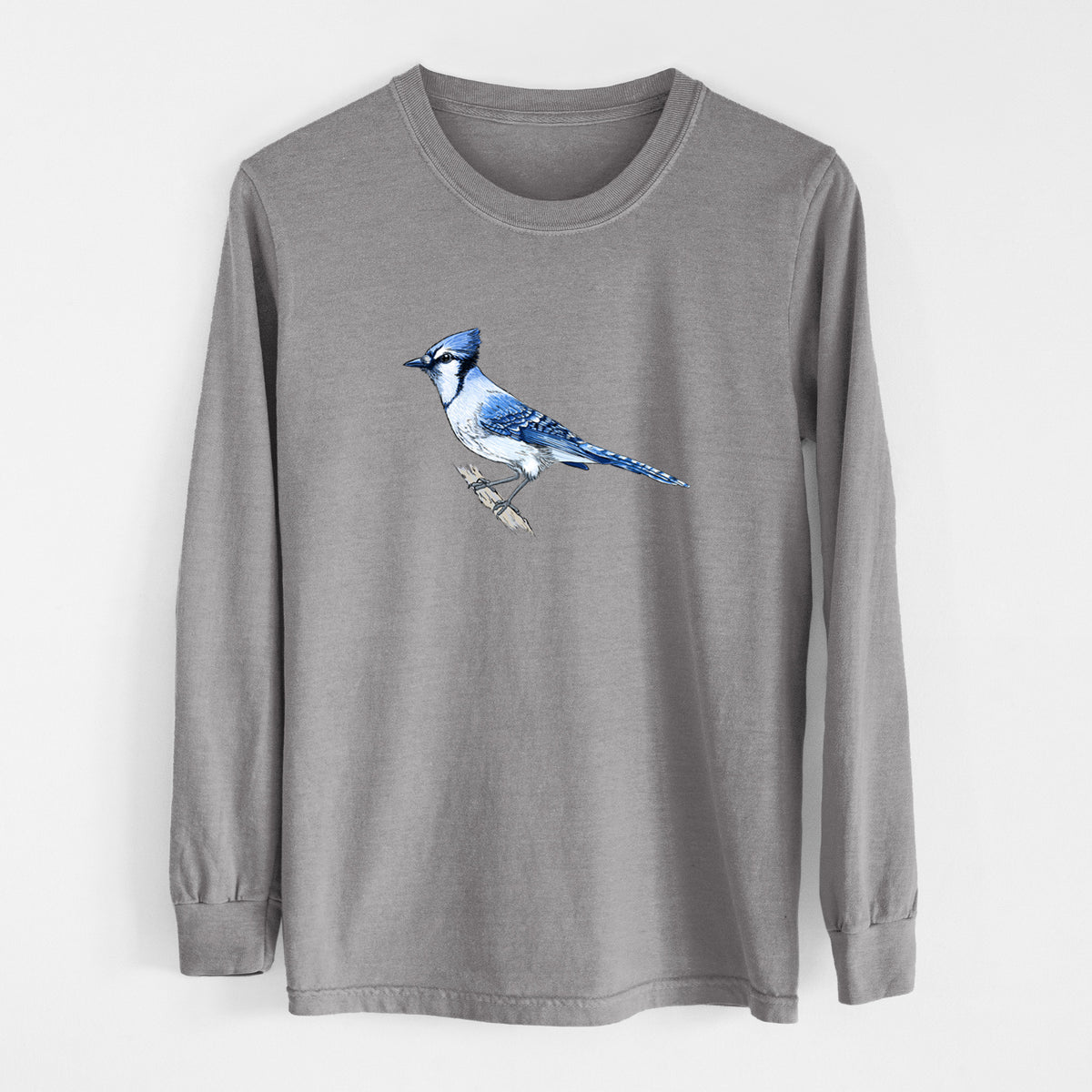 Grey Comfort Colors long sleeve shirt laid flat, printed with a full-color illustration of a blue jay perched on a branch.