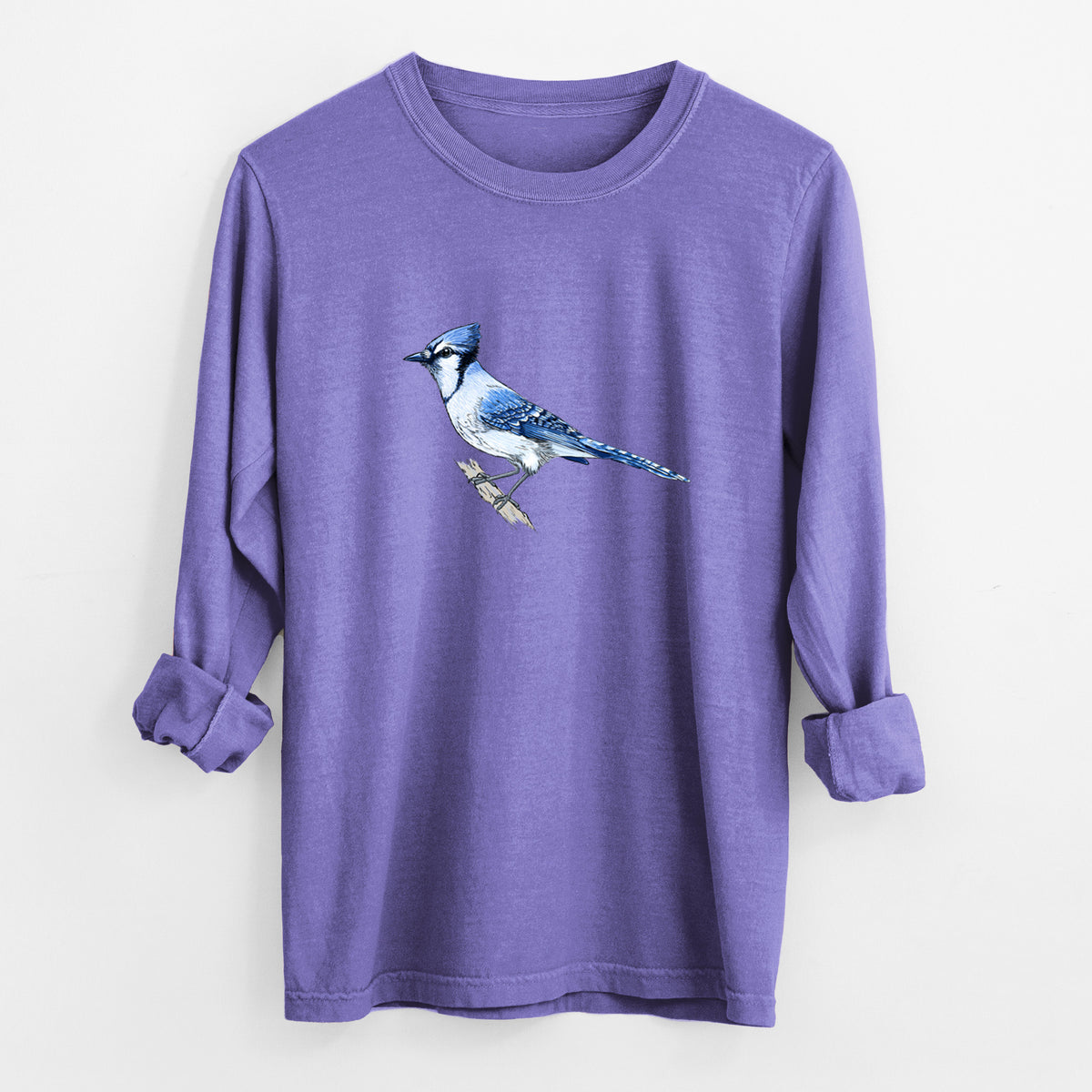 Violet purple Comfort Colors long sleeve shirt laid flat with the cuffs rolled, printed with a full-color illustration of a blue jay perched on a branch.