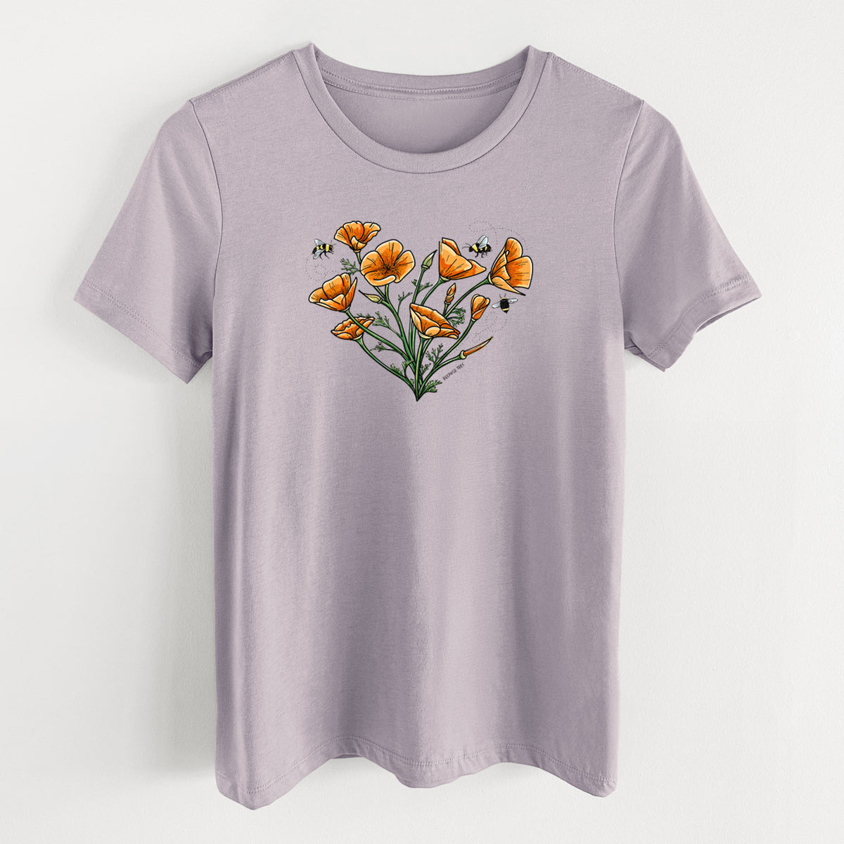 Light violet women's relaxed fit cotton t-shirt laid flat, printed with a full-color bouquet of orange California poppies arranged in a heart shape, with small bees.
