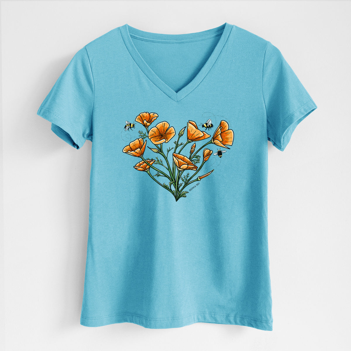 Turquoise women's relaxed fit cotton V-neck t-shirt laid flat, printed with a full-color bouquet of orange California poppies arranged in a heart shape, with small bees.