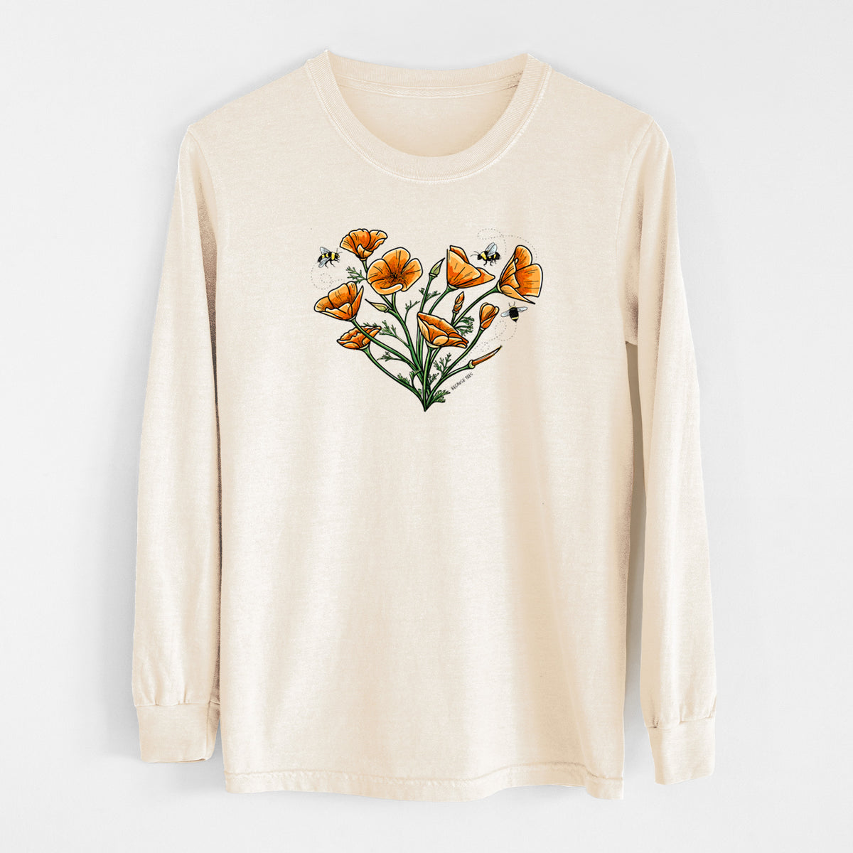 Ivory Comfort Colors long sleeve shirt laid flat, printed with a full-color bouquet of orange California poppies arranged in a heart shape, with small bees.