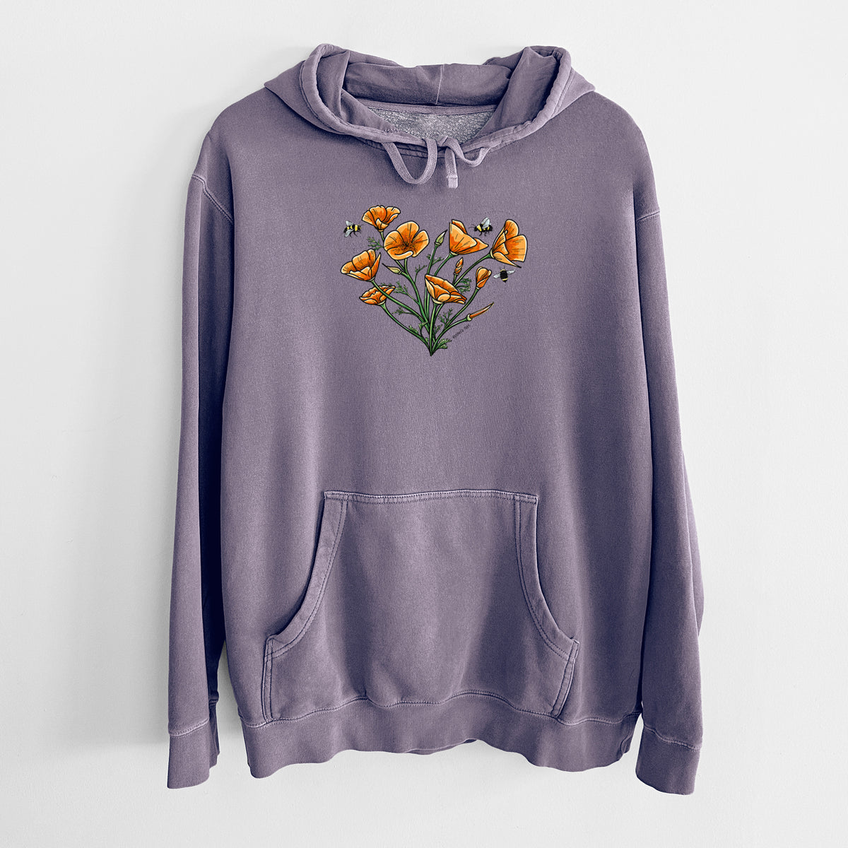 Plum purple pigment dyed hoodie laid flat, printed with a full-color bouquet of orange California poppies arranged in a heart shape, with small bees.