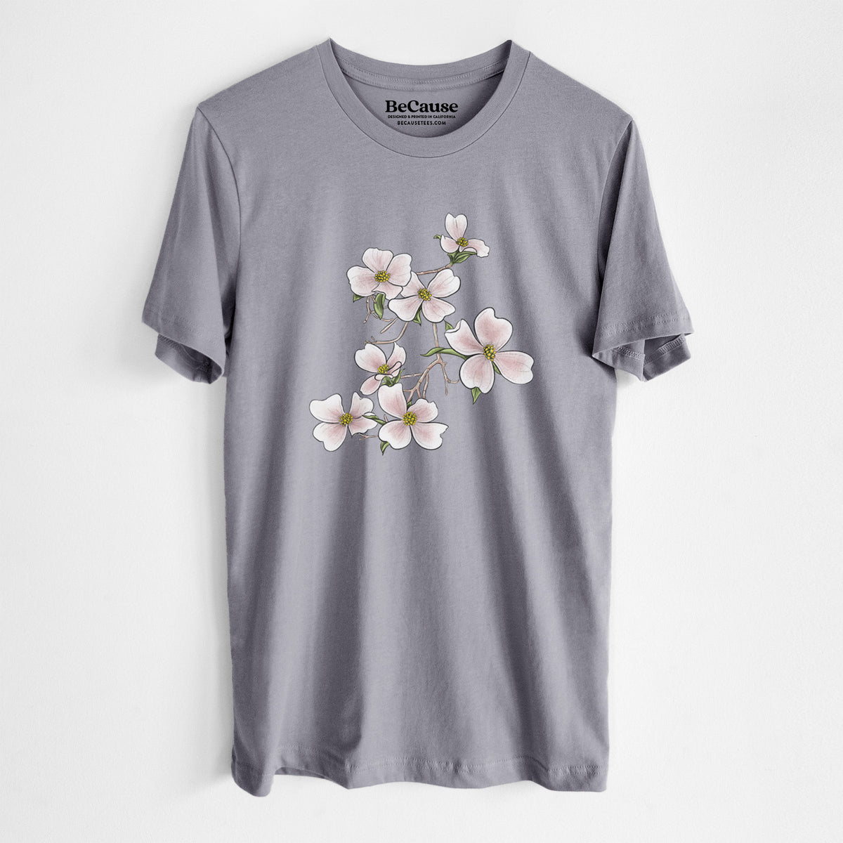 Storm grey lightweight cotton t-shirt laid flat, printed with a full-color illustration of pink and white dogwood blossoms on a branch.