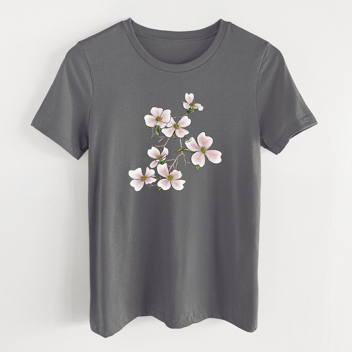 Asphalt women's relaxed fit cotton t-shirt laid flat, printed with a full-color illustration of pink and white dogwood blossoms on a branch.