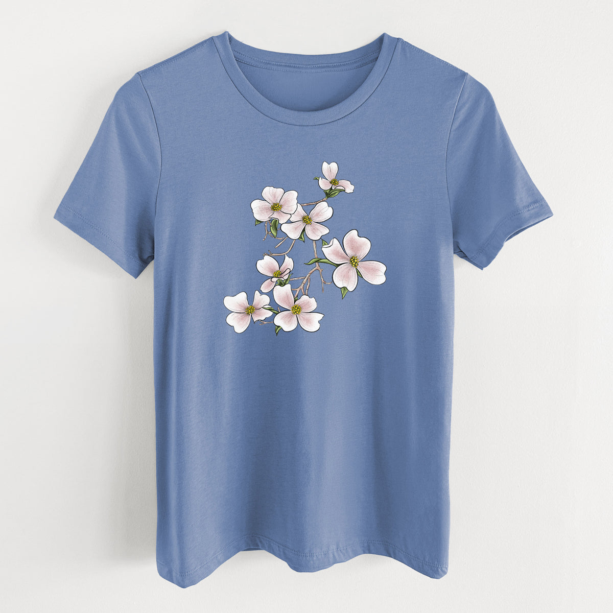 Blue bell women's relaxed fit cotton t-shirt laid flat, printed with a full-color illustration of pink and white dogwood blossoms on a branch.