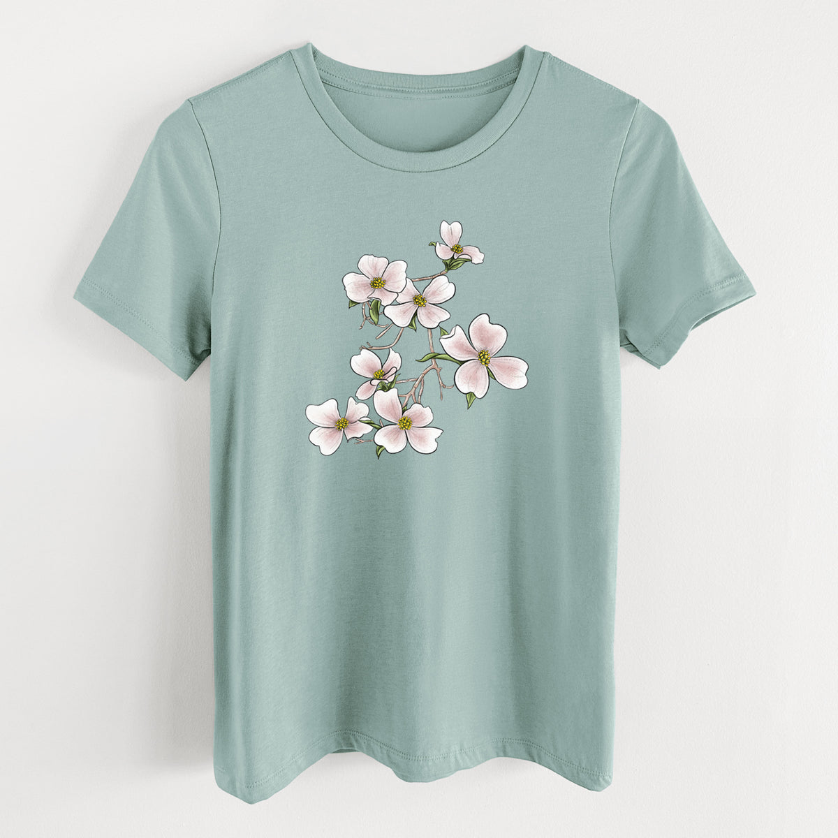 Dusty blue women's relaxed fit cotton t-shirt laid flat, printed with a full-color illustration of pink and white dogwood blossoms on a branch.