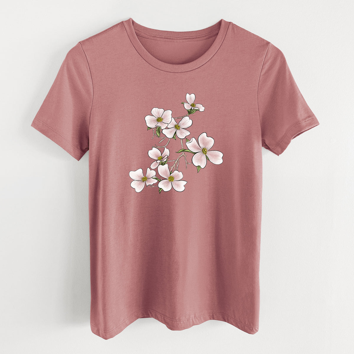 Mauve pink women's relaxed fit cotton t-shirt laid flat, printed with a full-color illustration of pink and white dogwood blossoms on a branch.