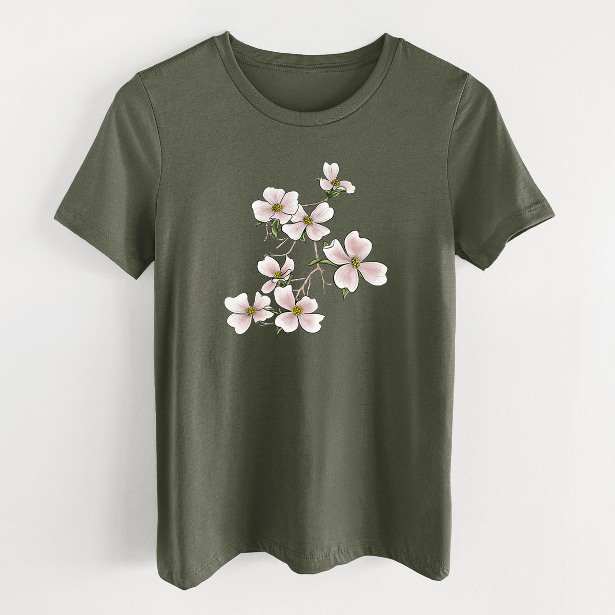 Military green women's relaxed fit cotton t-shirt laid flat, printed with a full-color illustration of pink and white dogwood blossoms on a branch.