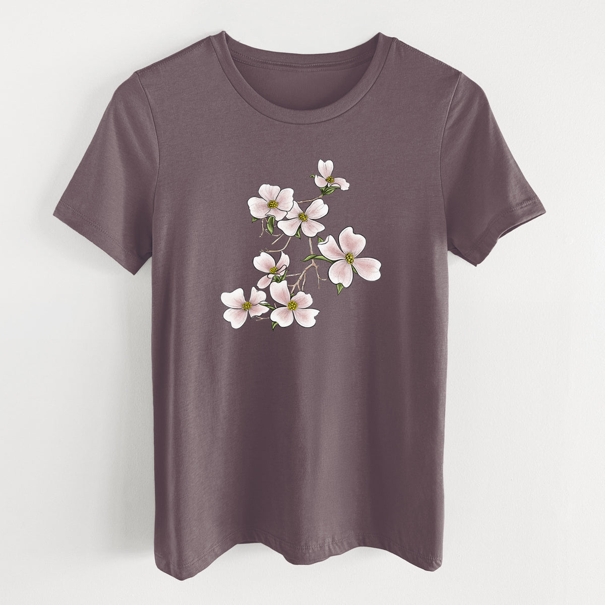 Purple storm women's relaxed fit cotton t-shirt laid flat, printed with a full-color illustration of pink and white dogwood blossoms on a branch.