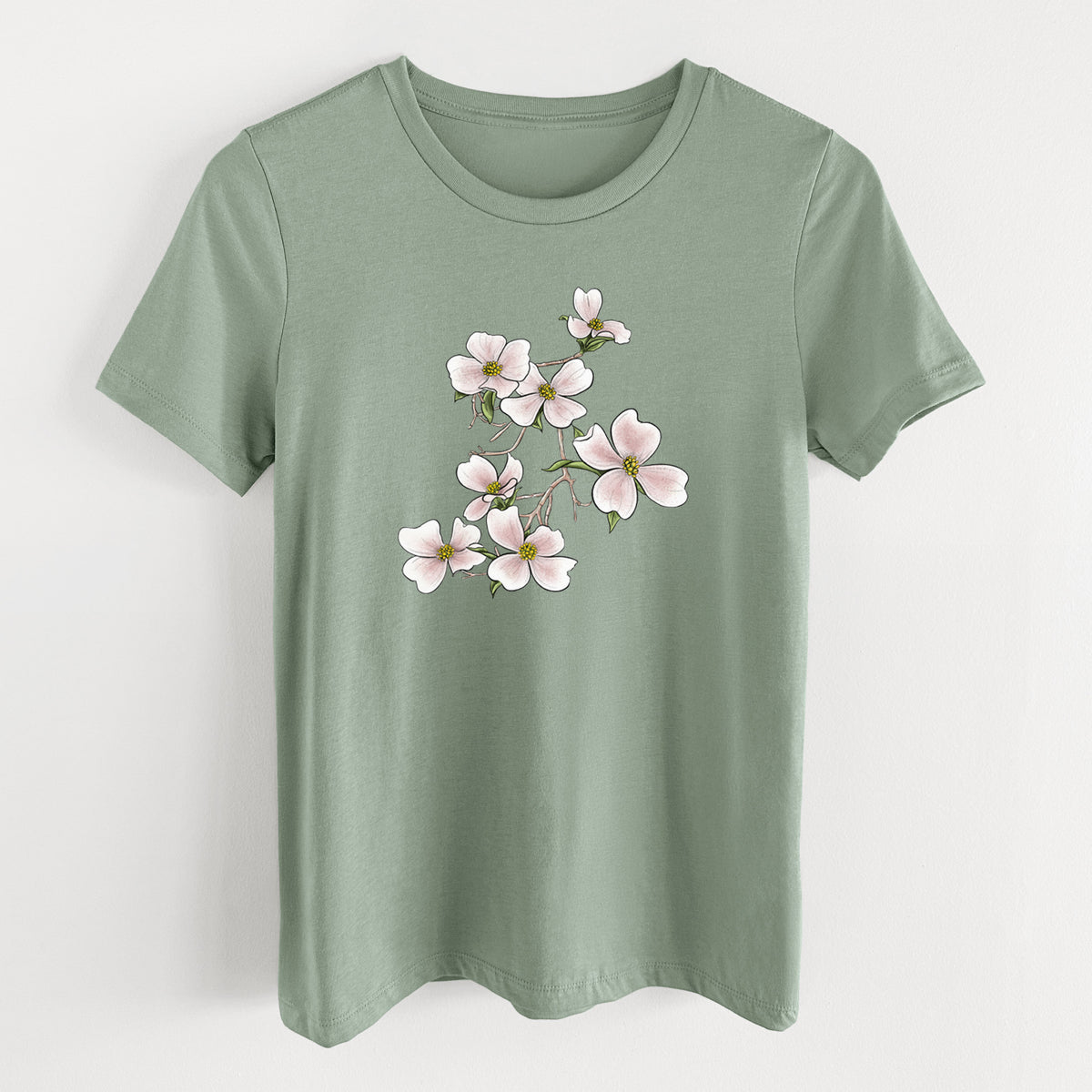 Sage green women's relaxed fit cotton t-shirt laid flat, printed with a full-color illustration of pink and white dogwood blossoms on a branch.