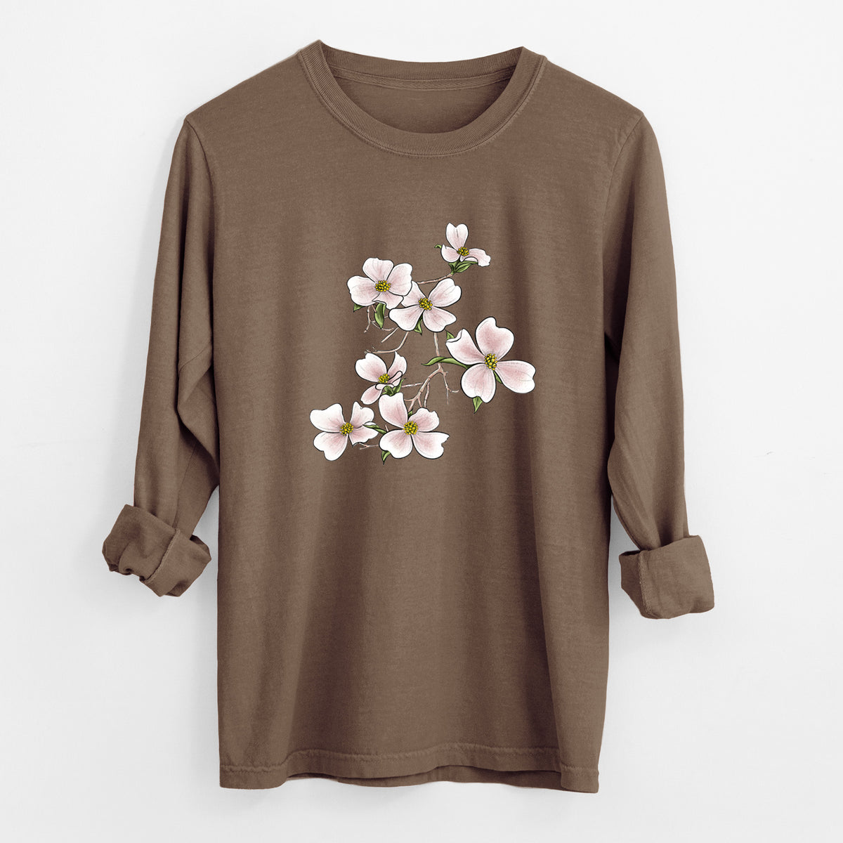 Espresso brown Comfort Colors long sleeve shirt laid flat with the cuffs rolled, printed with a full-color illustration of pink and white dogwood blossoms on a branch.