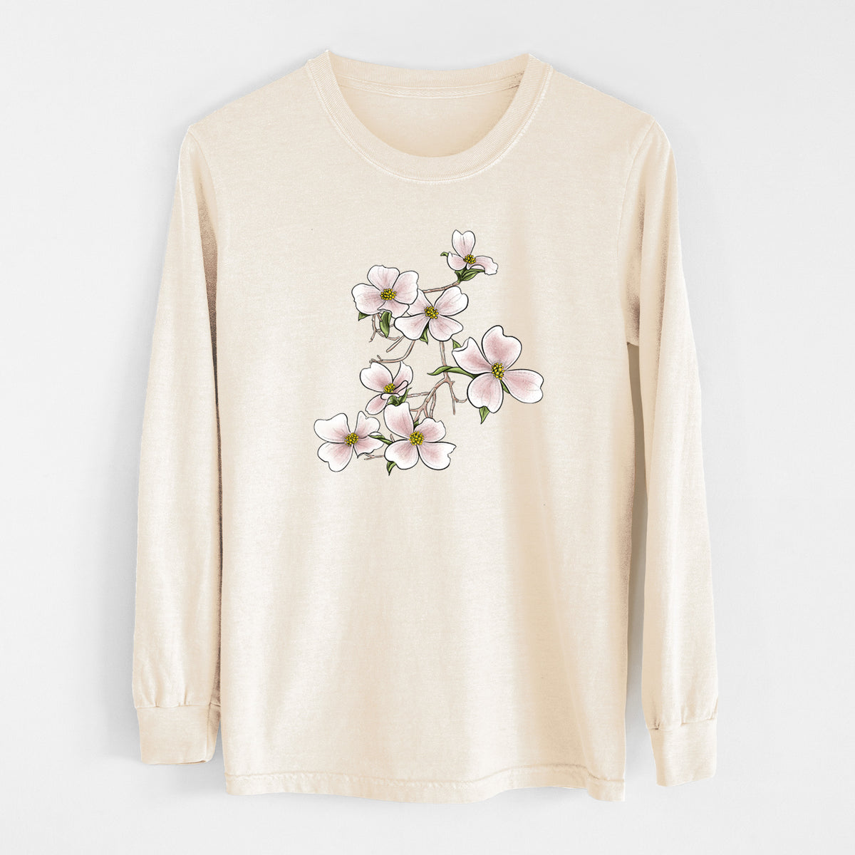 Ivory Comfort Colors long sleeve shirt laid flat, printed with a full-color illustration of pink and white dogwood blossoms on a branch.