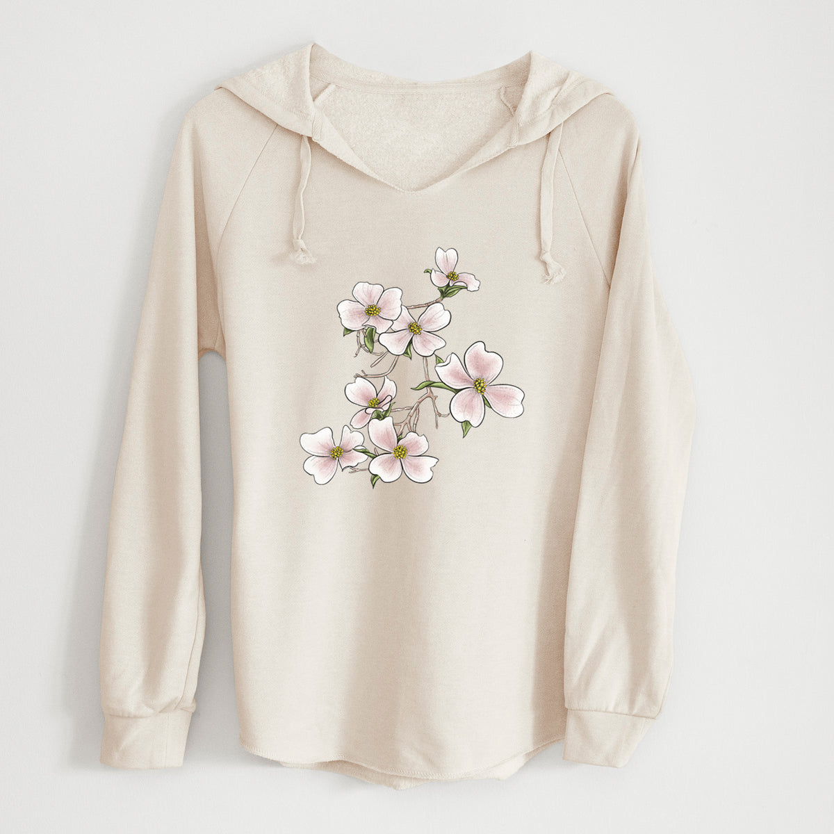 Bone cream women's Cali Wave hooded sweatshirt laid flat, printed with a full-color illustration of pink and white dogwood blossoms on a branch.