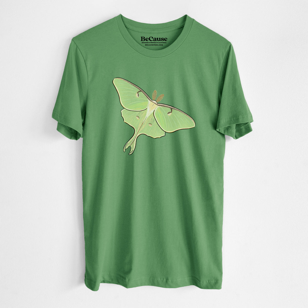Leaf green lightweight cotton t-shirt laid flat, printed with a full-color illustration of a pale green luna moth with long tails on its wings.