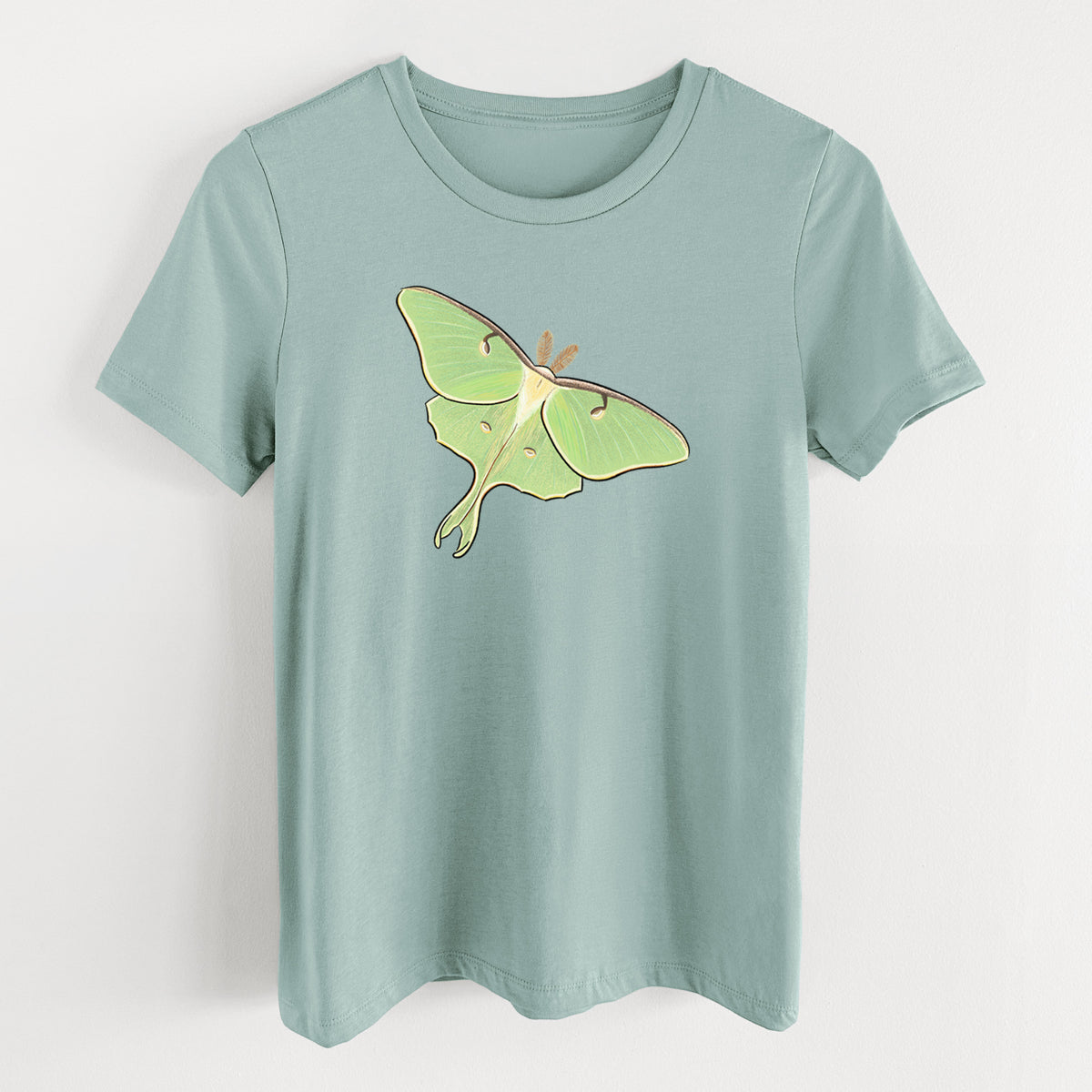 Dusty blue women's relaxed fit cotton t-shirt laid flat, printed with a full-color illustration of a pale green luna moth with long tails on its wings.