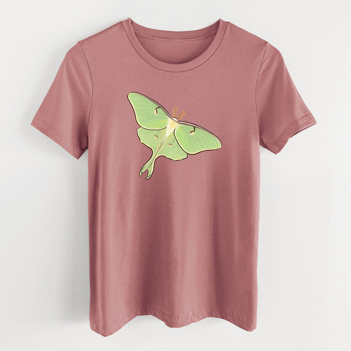 Mauve pink women's relaxed fit cotton t-shirt laid flat, printed with a full-color illustration of a pale green luna moth with long tails on its wings.