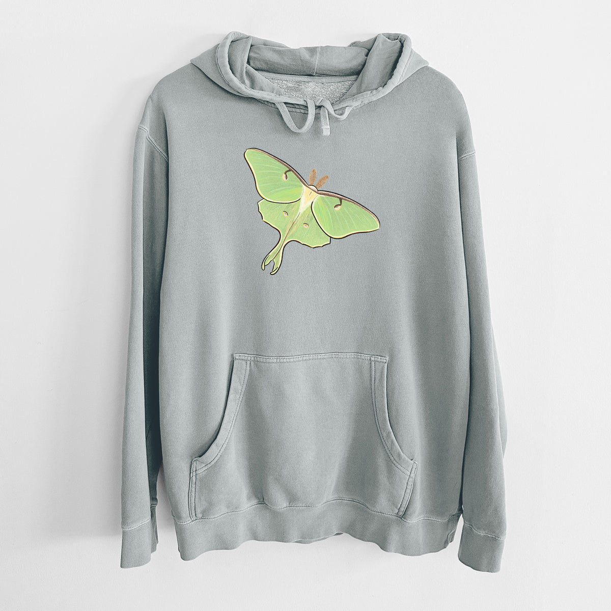 Sage green pigment dyed hoodie laid flat, printed with a full-color illustration of a pale green luna moth with long tails on its wings.