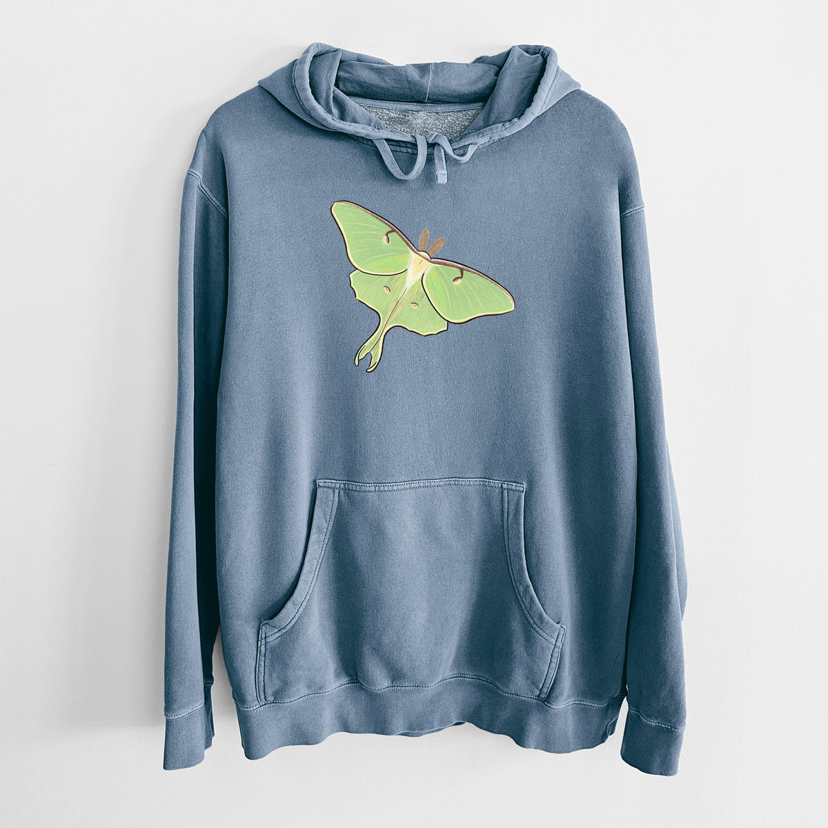 Slate blue pigment dyed hoodie laid flat, printed with a full-color illustration of a pale green luna moth with long tails on its wings.