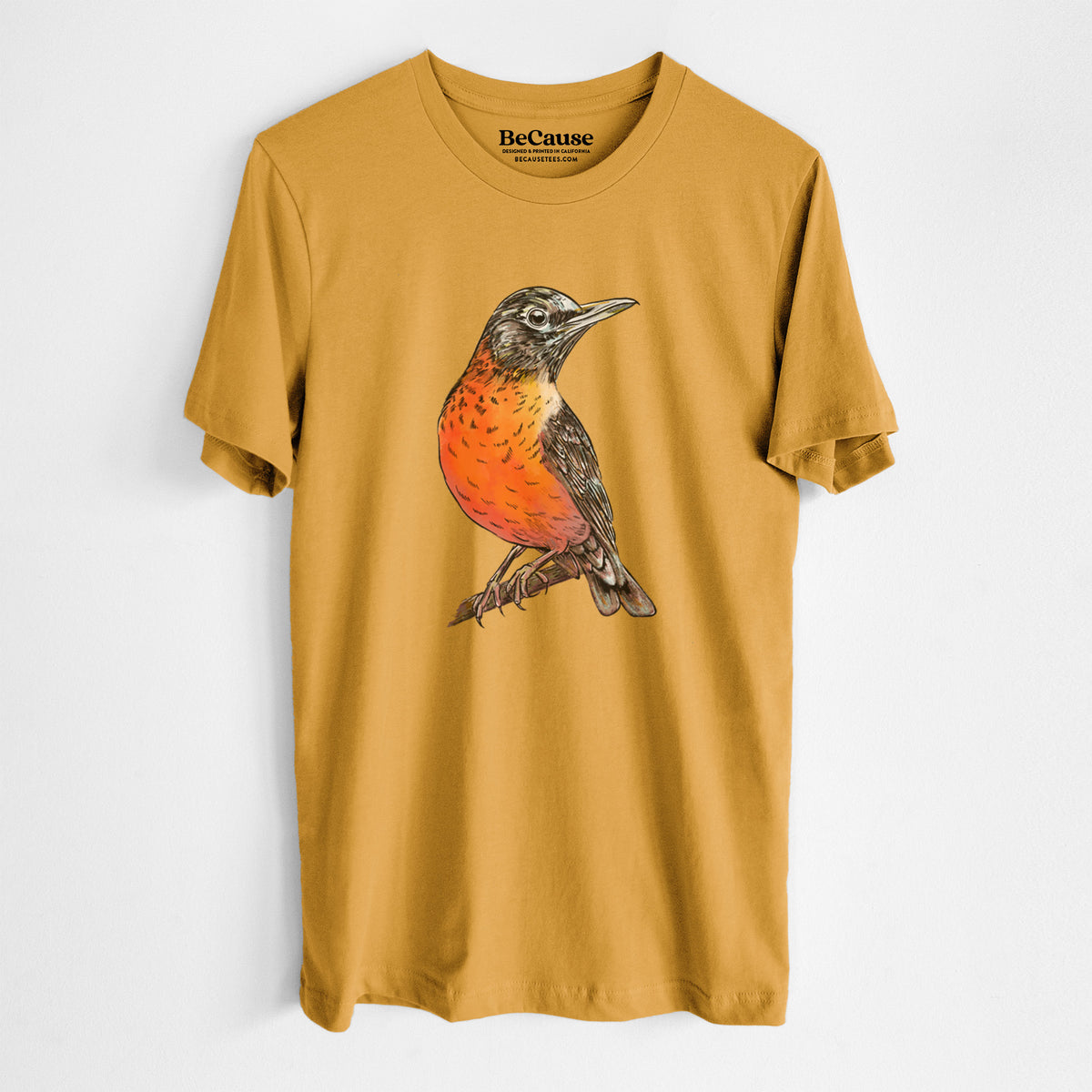 Mustard yellow lightweight cotton t-shirt laid flat, printed with a full-color illustration of an American robin with an orange breast perched on a branch.