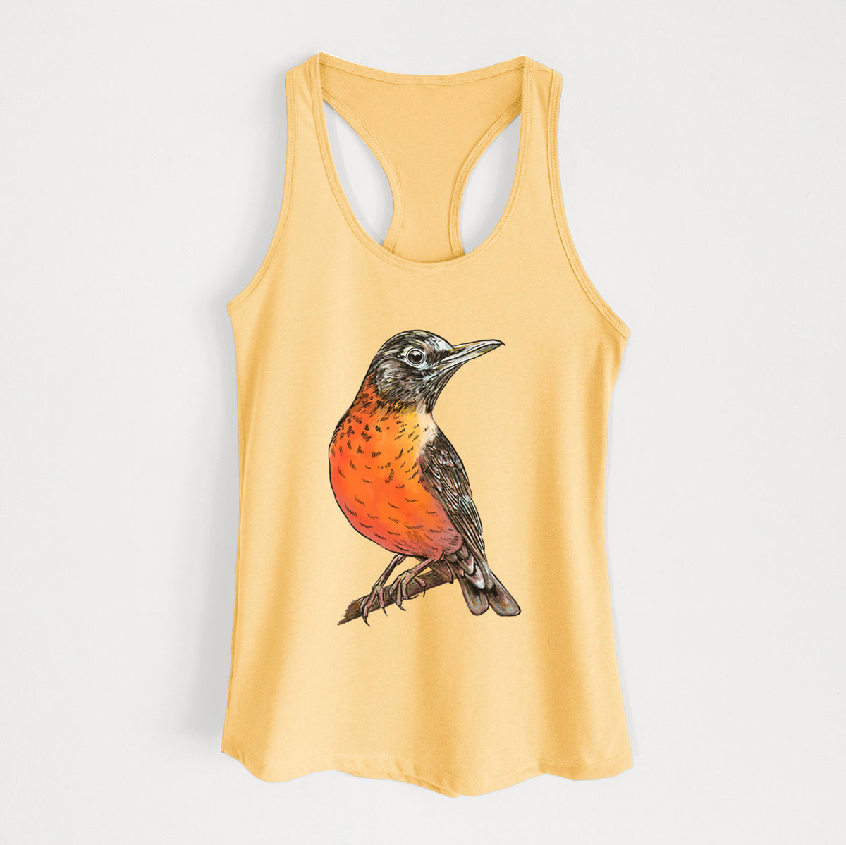 Banana cream women's racerback tank top laid flat, printed with a full-color illustration of an American robin with an orange breast perched on a branch.