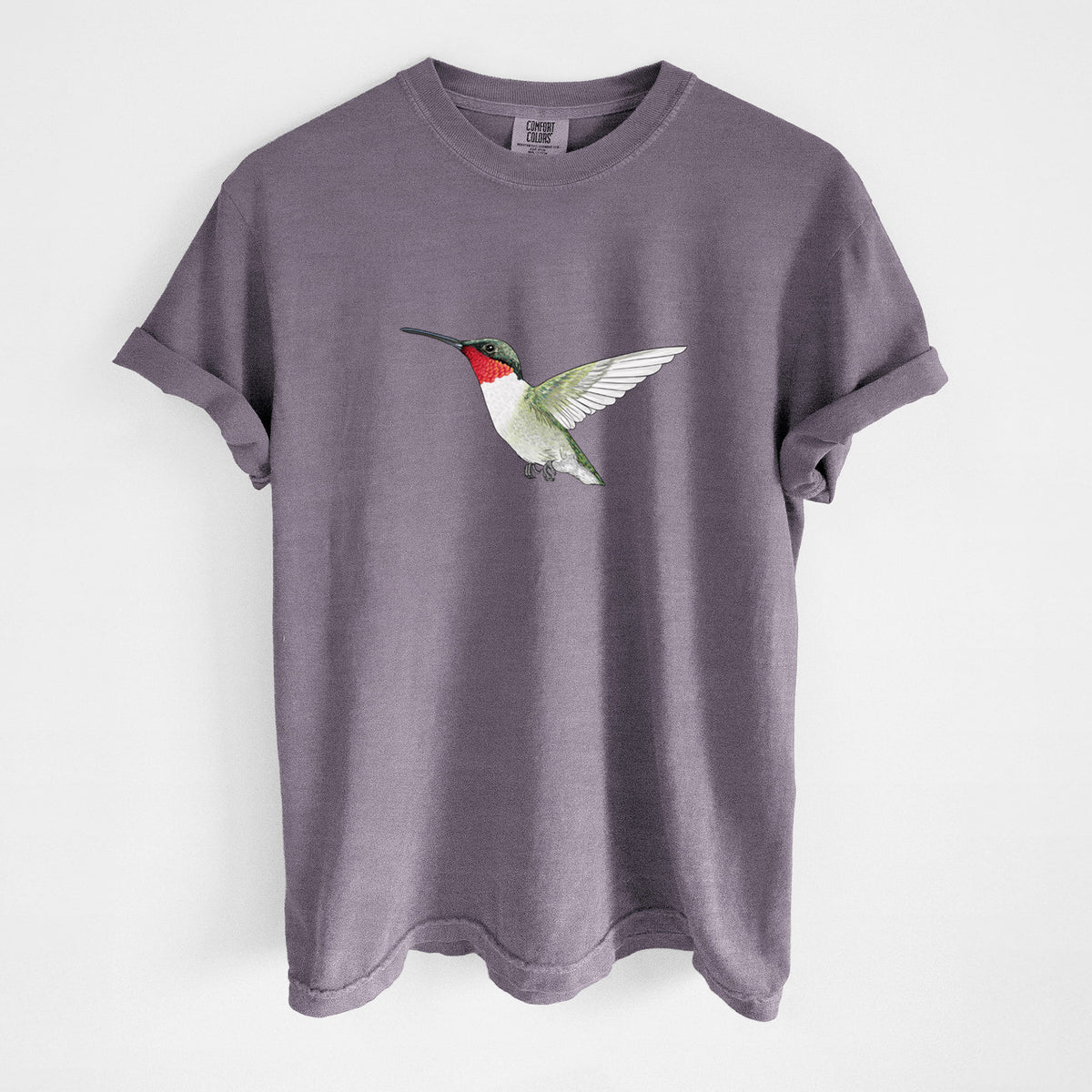 Wine red Comfort Colors t-shirt laid flat, printed with a full-color illustration of a ruby-throated hummingbird in flight.