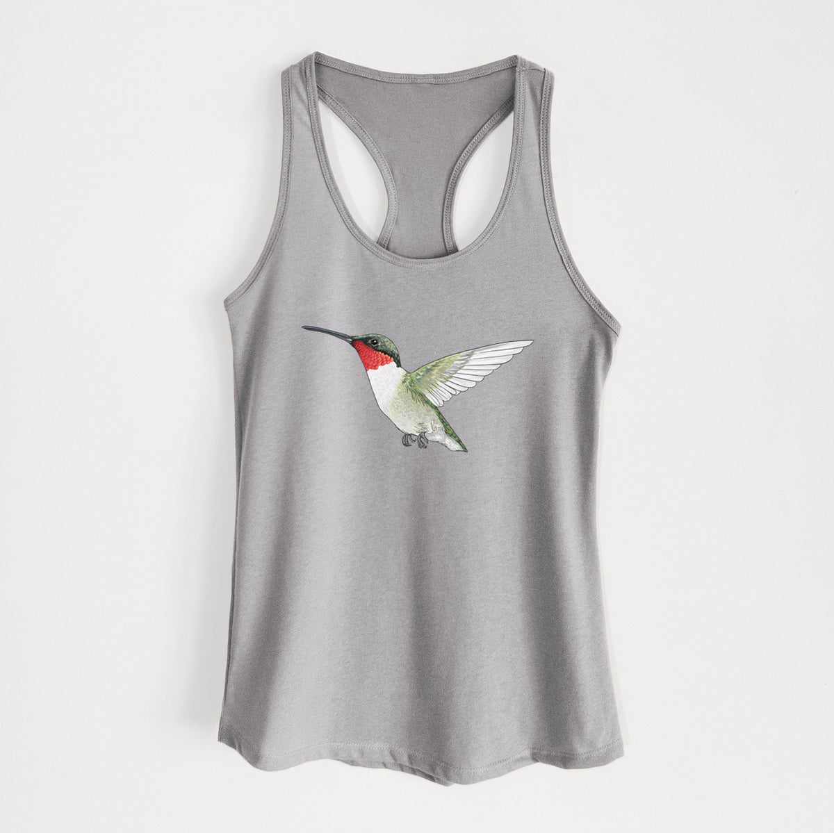 Heather grey women's racerback tank top laid flat, printed with a full-color illustration of a ruby-throated hummingbird in flight.