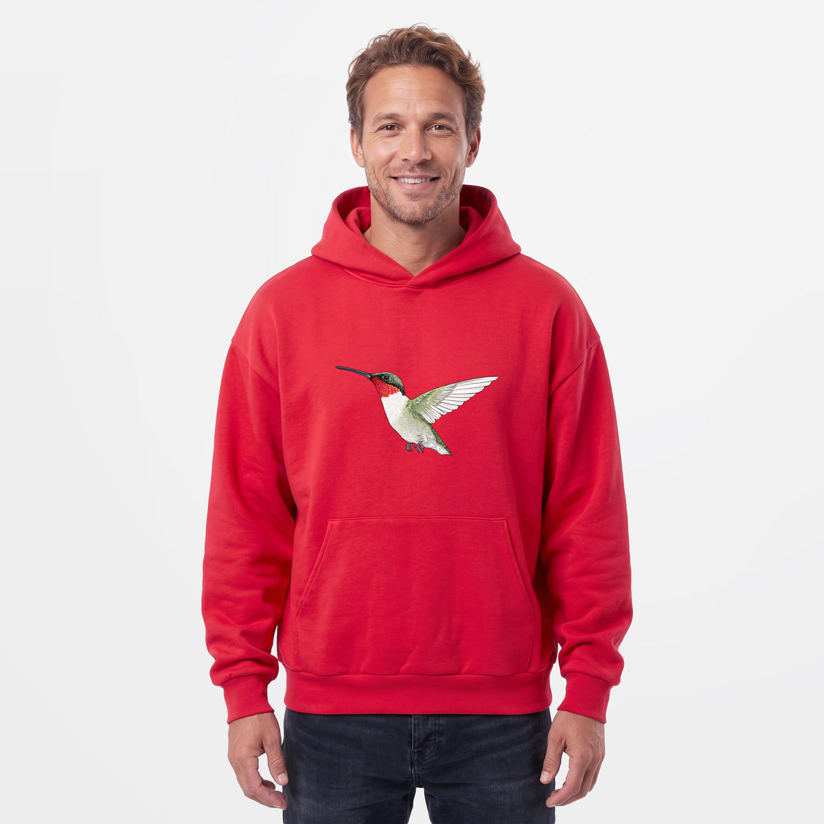 Male model wearing the Vibrant Ruby-throated Hummingbird - Archilochus colubris - Statement Midweight Hoodie.