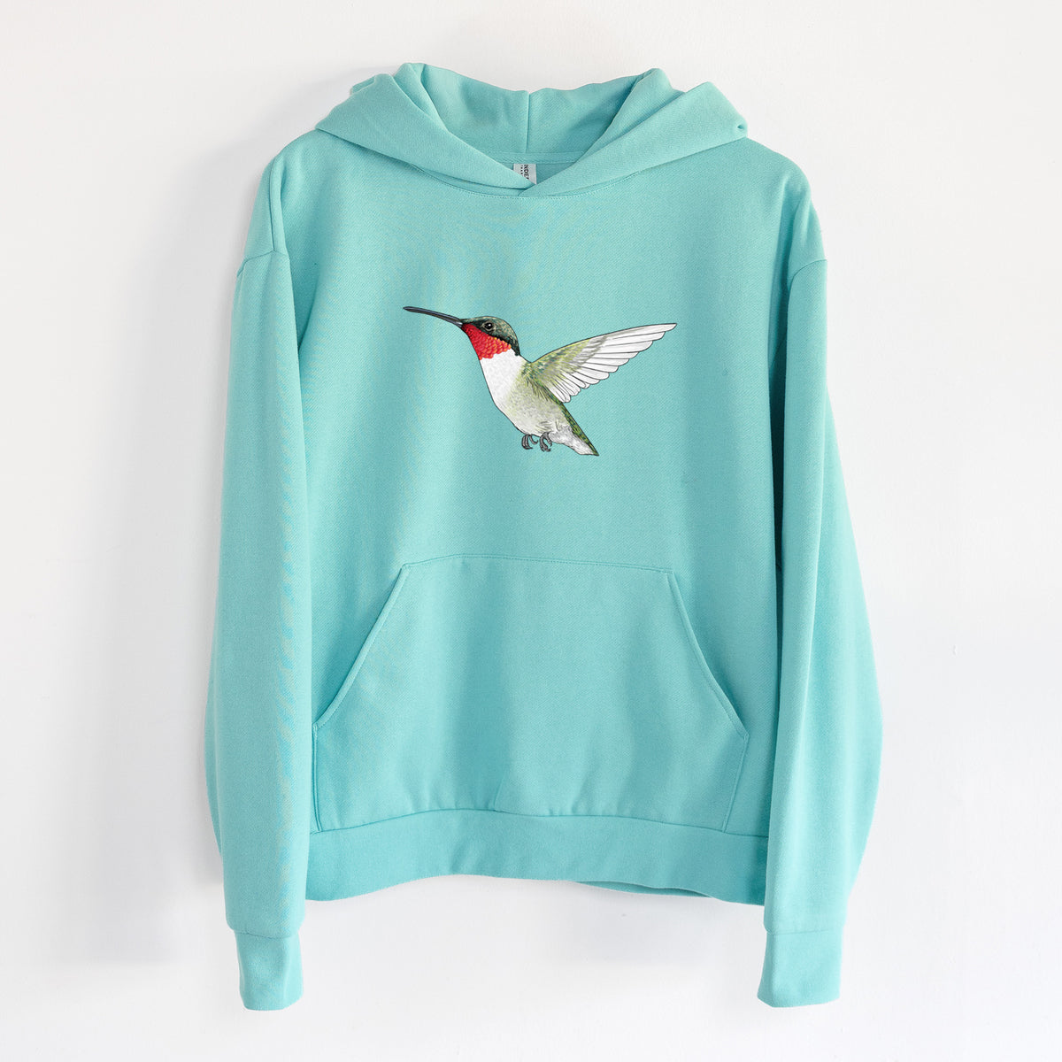 Vibrant Ruby-throated Hummingbird - Archilochus colubris - Statement Midweight Hoodie in Seafoam, hanging on a white wall, with a front kangaroo pocket and no drawcords.