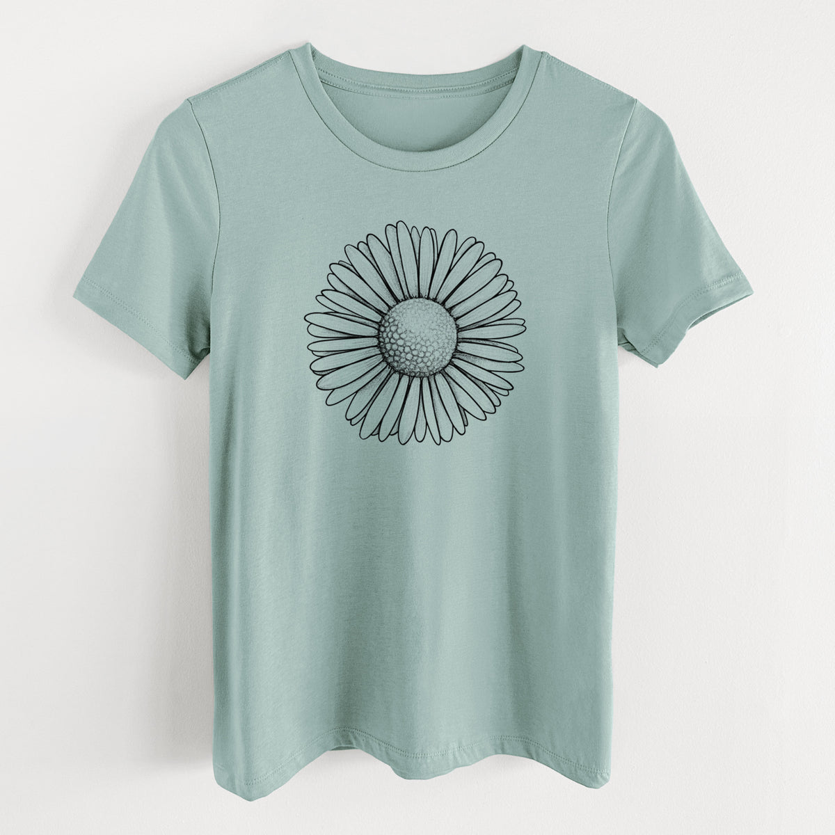 Dusty blue women's relaxed fit cotton t-shirt laid flat, printed with a detailed black ink line drawing of a single common daisy flower.