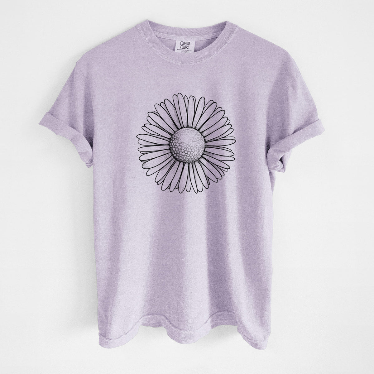 Orchid purple Comfort Colors t-shirt laid flat, printed with a detailed black ink line drawing of a single common daisy flower.