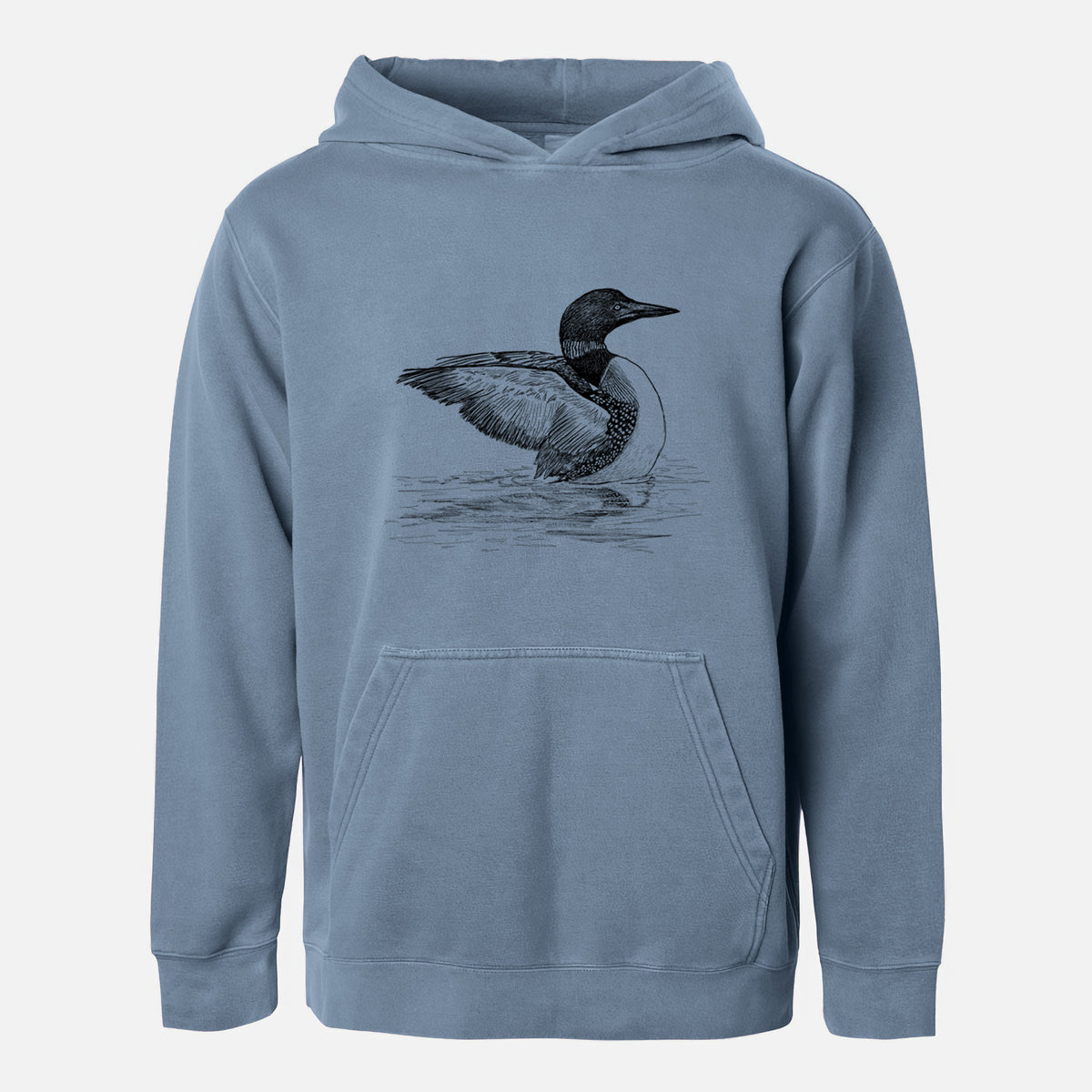 Slate blue youth pigment dyed hoodie laid flat, printed with a detailed black ink sketch of a common loon floating on rippling water.