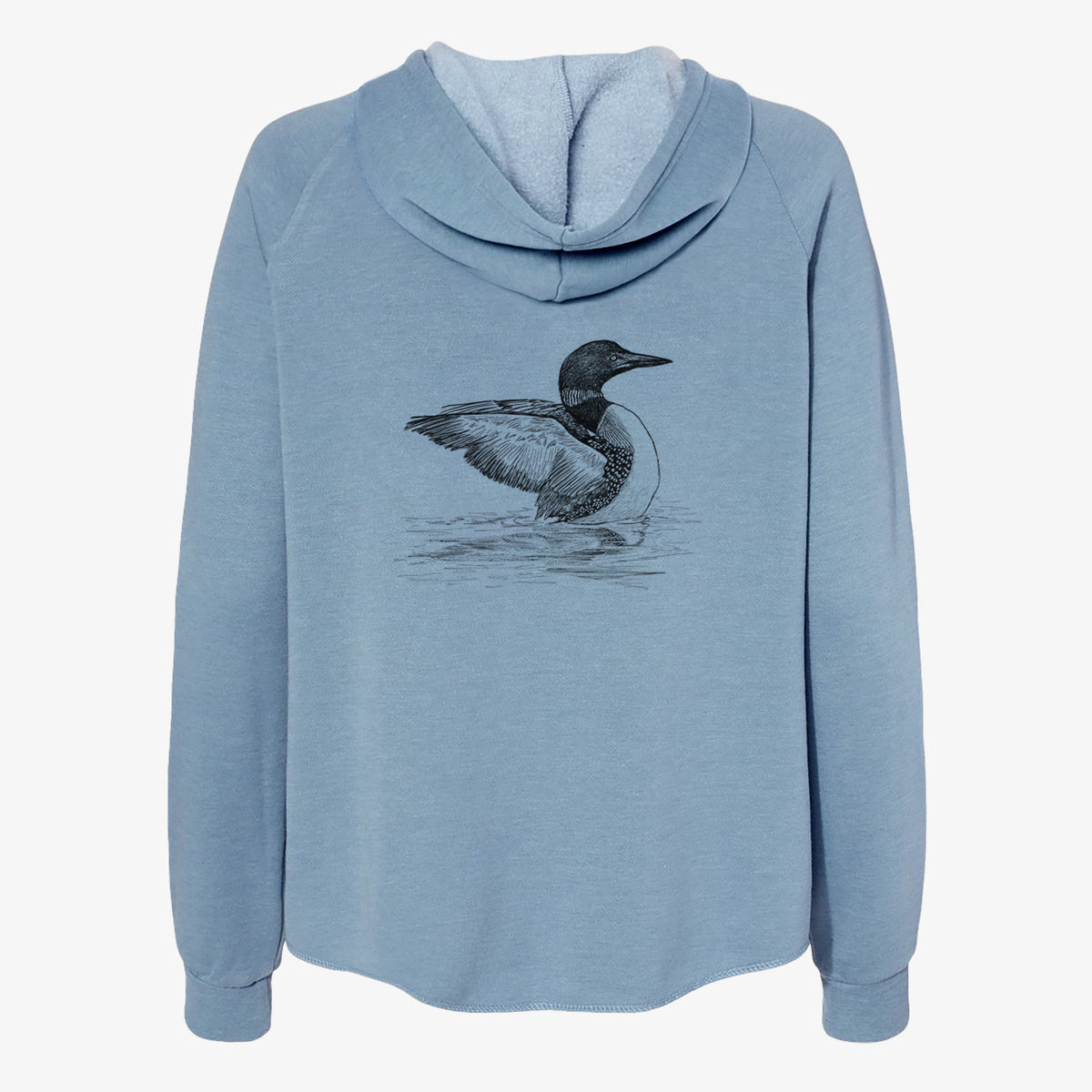 Misty blue women's Cali Wave zip-up sweatshirt laid flat, printed with a detailed black ink sketch of a common loon floating on rippling water.