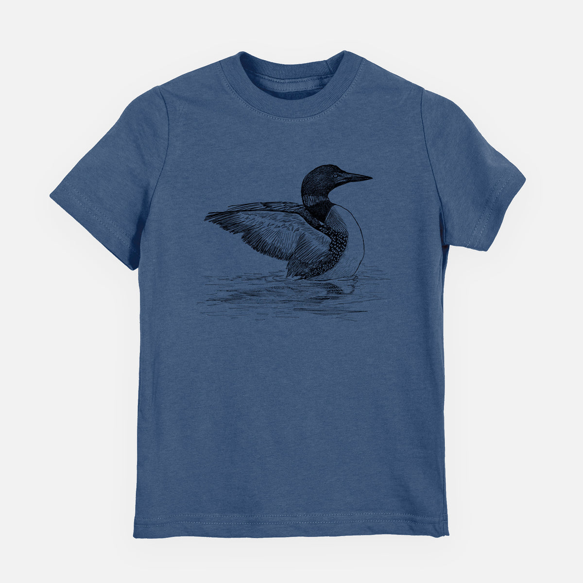 Indigo blue youth t-shirt laid flat, printed with a detailed black ink sketch of a common loon floating on rippling water.