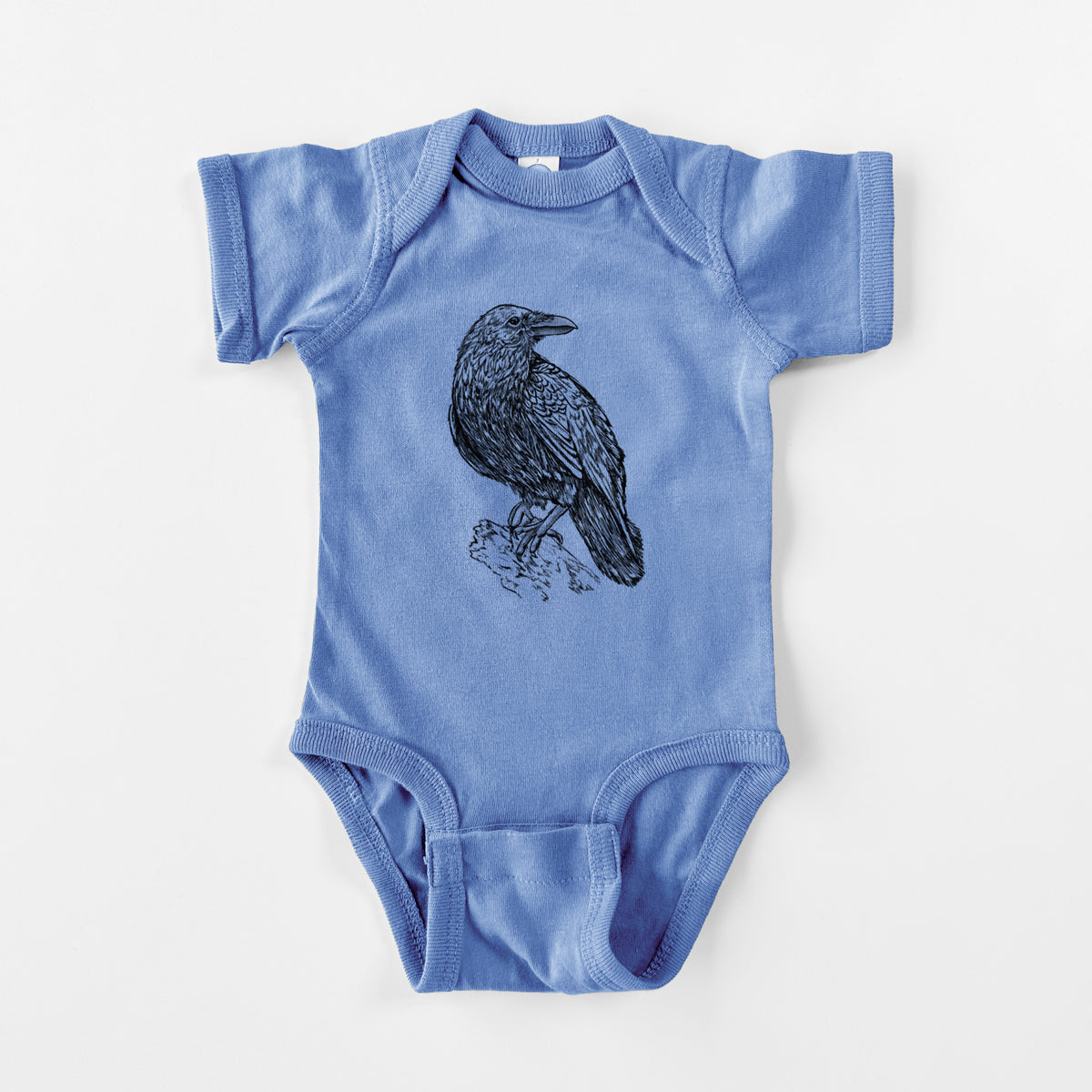 Carolina blue baby bodysuit laid flat, printed with a detailed black ink sketch of a common raven perched on a rock.