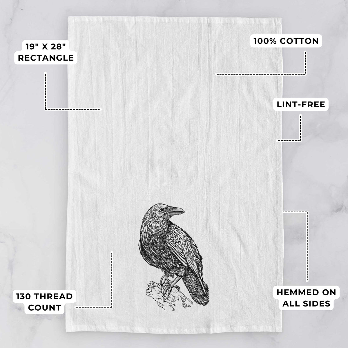 White tea towel printed with a detailed black ink sketch of a common raven perched on a rock, with feature labels: 19 by 28 inch rectangle, 100% cotton, lint-free, 130 thread count, hemmed on all sides.