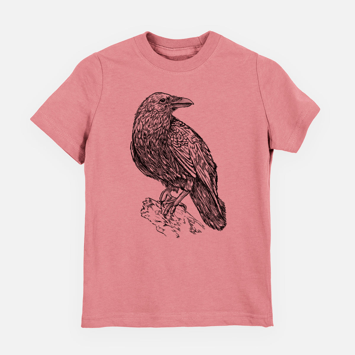 Mauve pink youth t-shirt laid flat, printed with a detailed black ink sketch of a common raven perched on a rock.