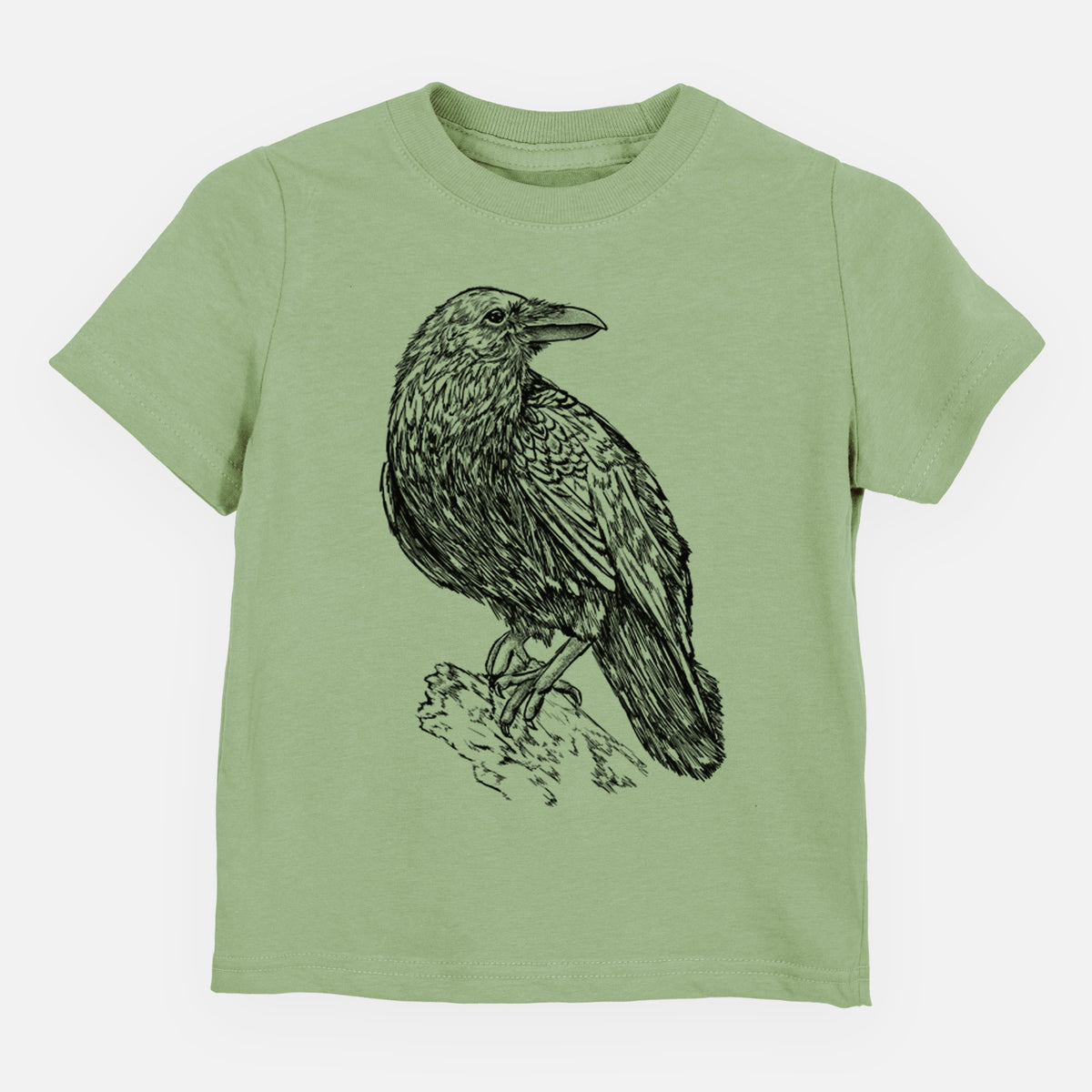Sage green toddler t-shirt laid flat, printed with a detailed black ink sketch of a common raven perched on a rock.