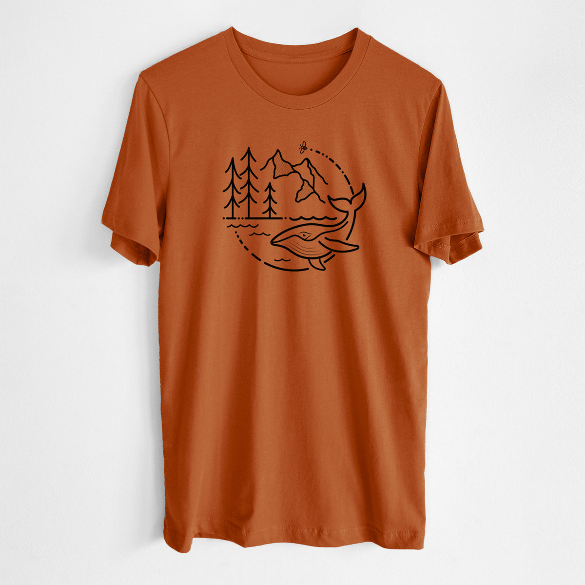 Autumn lightweight cotton t-shirt laid flat, printed with a black line art circle connecting a mountain range, pine trees, a bee and a whale swimming in ocean waves.
