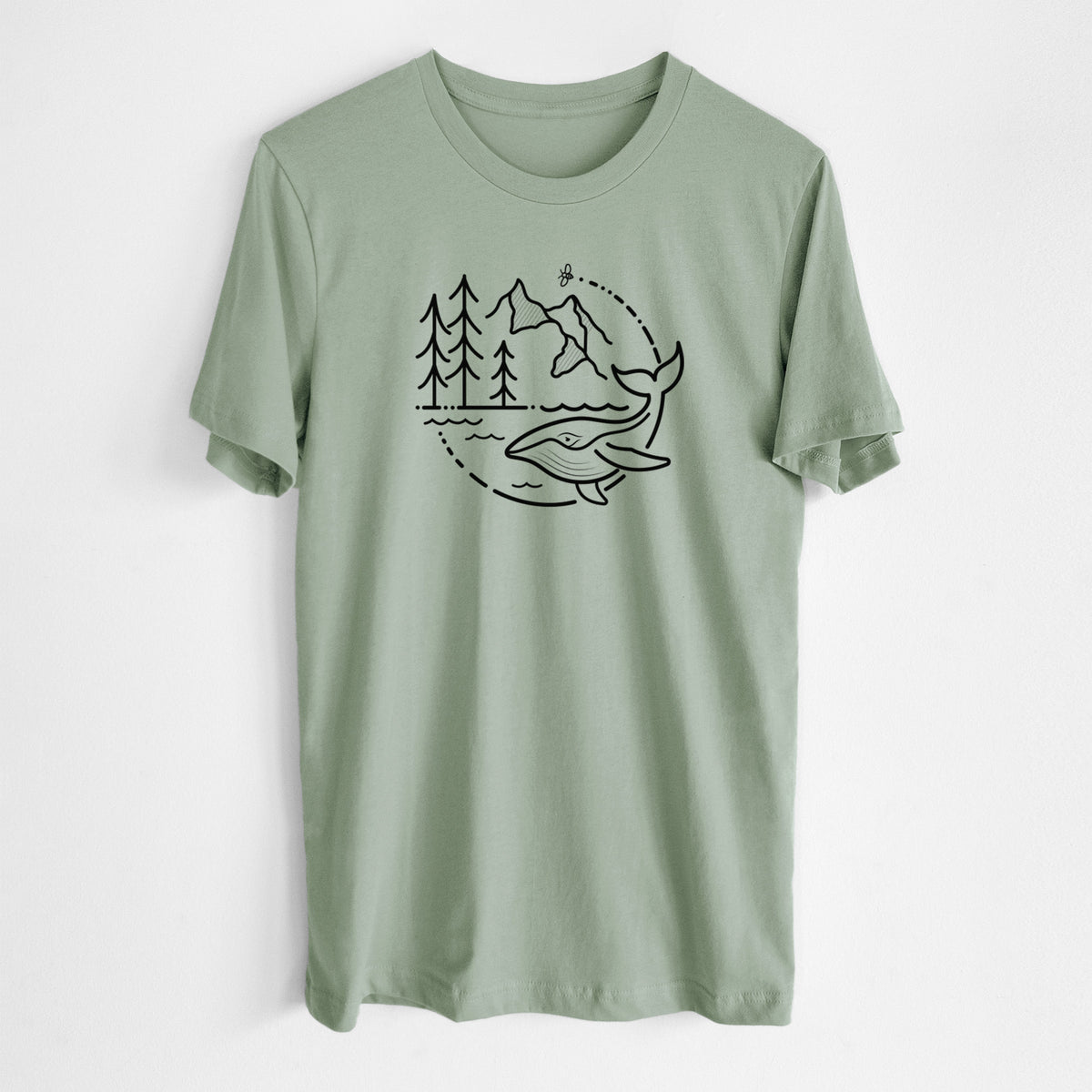 Sage green lightweight cotton t-shirt laid flat, printed with a black line art circle connecting a mountain range, pine trees, a bee and a whale swimming in ocean waves.