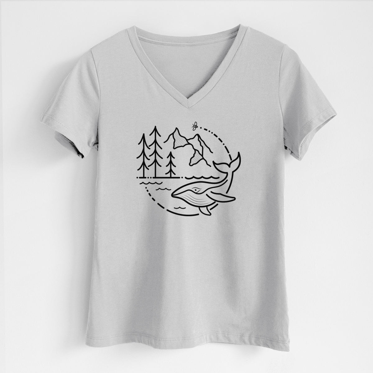 Lunar grey women's relaxed fit cotton V-neck t-shirt laid flat, printed with a black line art circle connecting a mountain range, pine trees, a bee and a whale swimming in ocean waves.